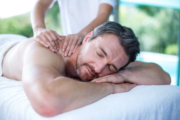 Kumpang Thai Massage man receiving back thai massage from masseur